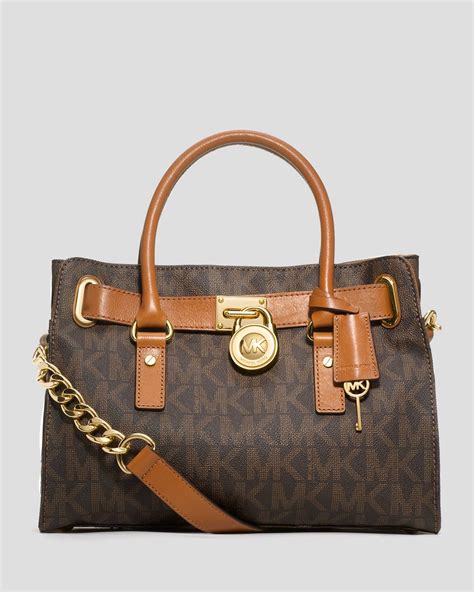 michael kors hamilton east west brown logo satchel handbag|Michael Kors Hamilton studded bag.